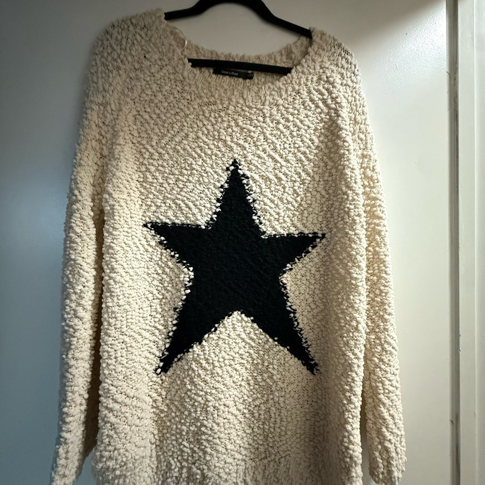 Elegant Cream Sweater with Black Star
